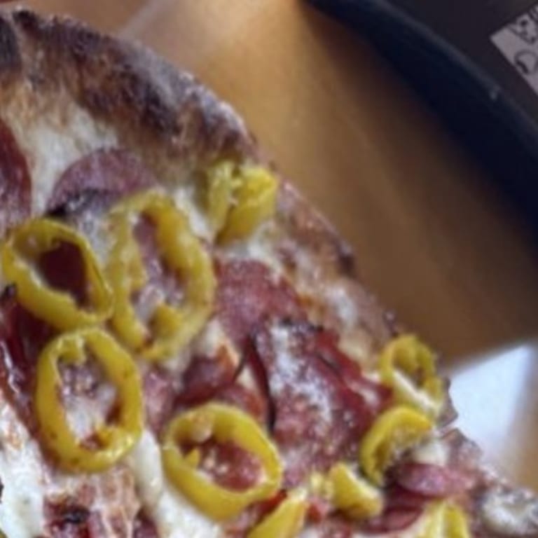 Indulge in Our Meat Pizza